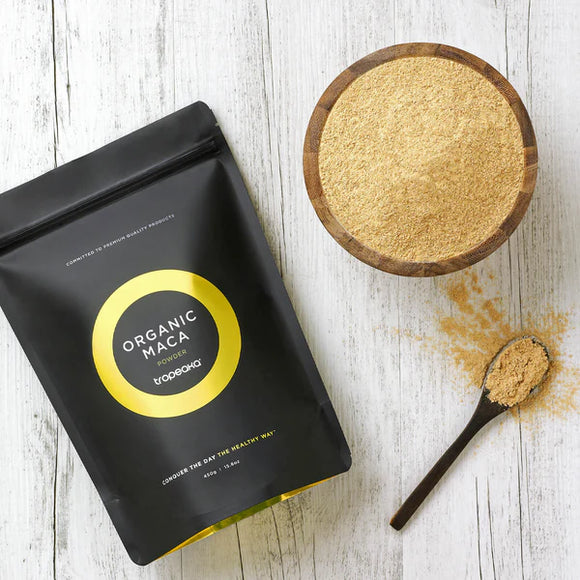 Tropeaka Organic Maca Powder with wooden bowl and spoon